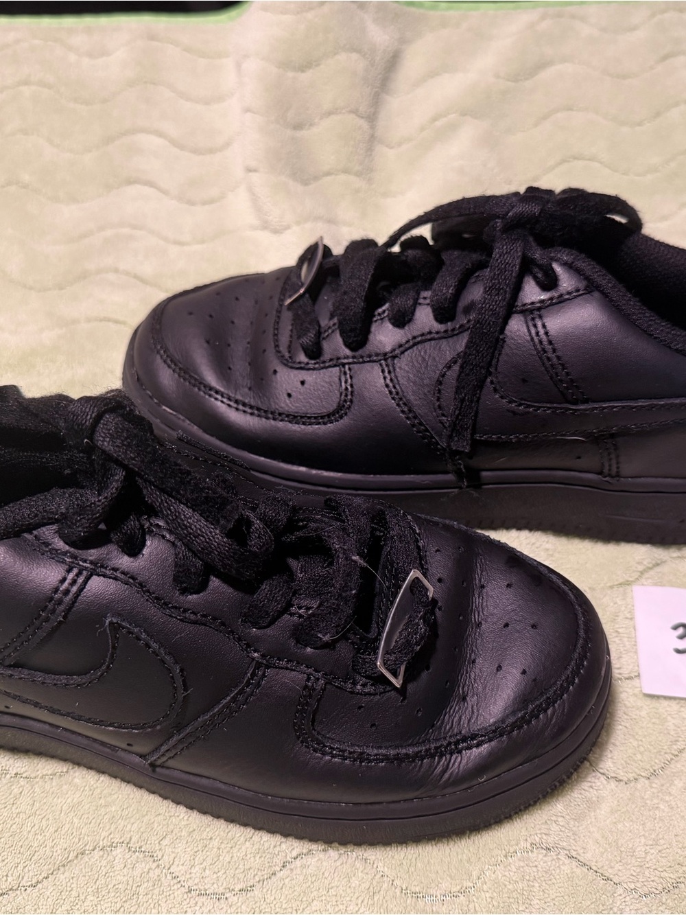 Nike Kids All-Black Low Top Sneakers